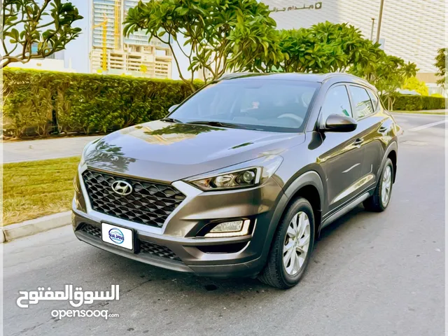 HYUNDAI TUCSON Model : 2019 Engine: 2.0L Odometer: 96000 km 4 Cylinder -Brown