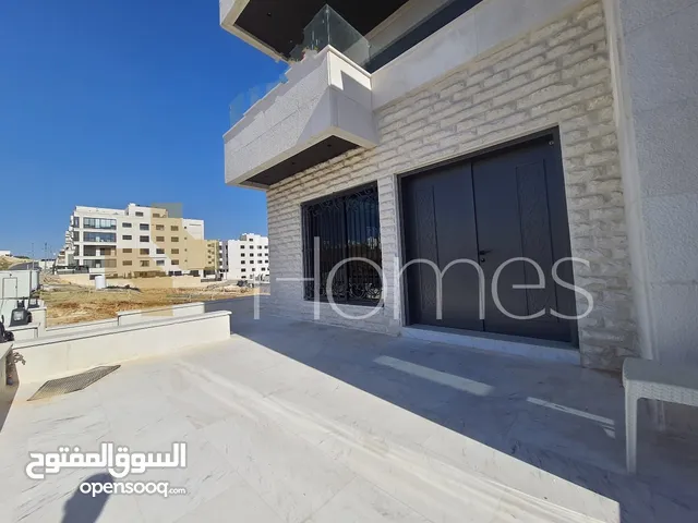 شقة ارضية مفروشة مع كراج خاص للبيع في رجم عميش بمساحة بناء 220م
