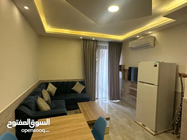 شقة للايجار ارضية (العمارة جديدة ) في شارع عبدالله غوشة - بجانب وزارة العمل