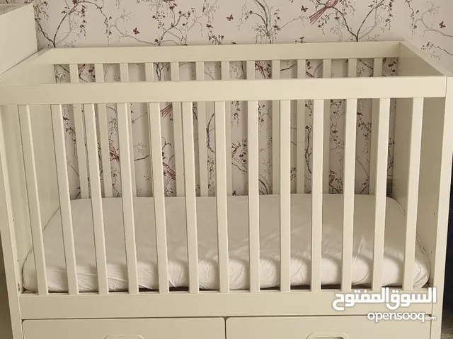 baby crib in very good condition  changing table in good condition