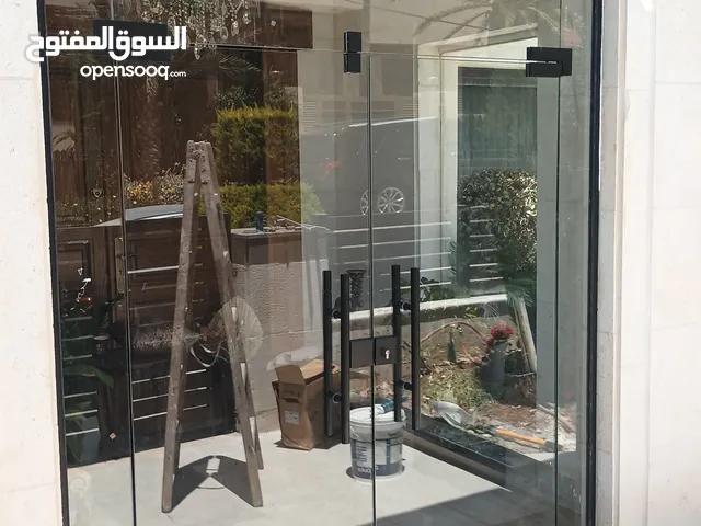 زين للزجاج والمرايا والسيكوريت