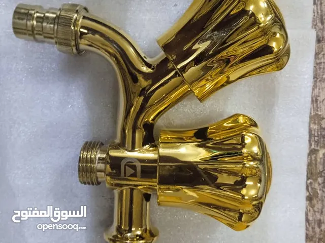حنفيات مشترك وعادي ومغاسل مفرد لون ذهبي