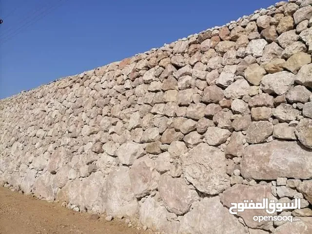 استصلاح الأراضي الزراعيه بناء سناسل حجريه واسلاك شائكه وكل ما يلزم من استصلاح شاليهات بناء مسابح