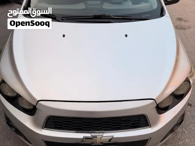 urgent sale Chevrolet Sonic clean condition full year passing and insurance till dec 2026