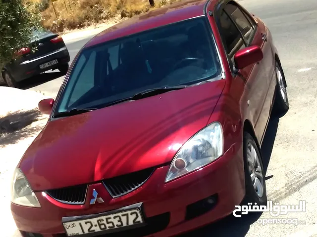 ميتسوبيشي لانسر 2004 فحص كامل 16 اصلي بحالة ممتازة