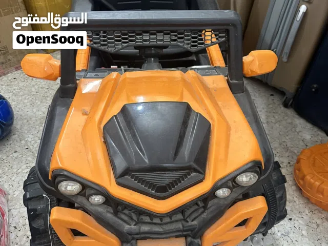 سيارة اطفال وترامبولين