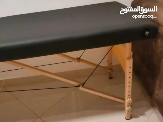 تخت مساج رجلين خشب