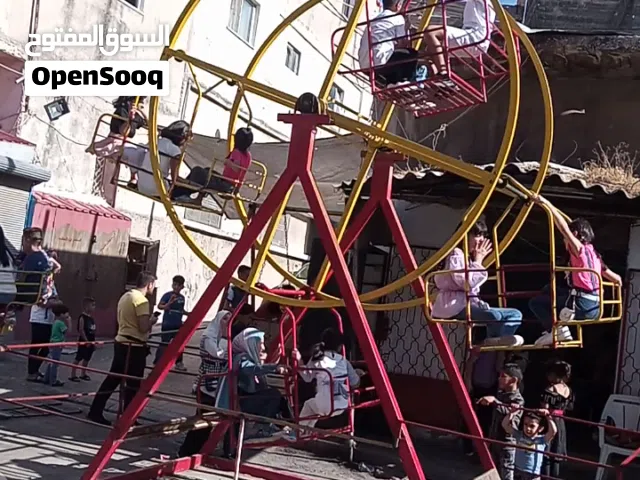 العاب ترابولينا ومراجيح ودولاب