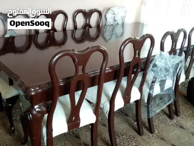 طاولة سفرة ثمانية مقاعد