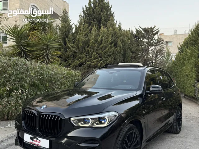 BMW X5 45e 2022 كهرباء بنزين محرك 3000 400 حصان دفعه اولى وشكات 36 شهر بدون بنوك أو مؤسسات