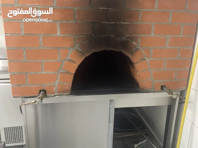 فرن حجري متنقل مستعمل بشكل بسيط للبيع