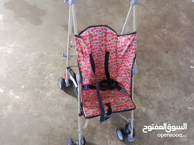 عرباية اطفال ودراجة كهربائية