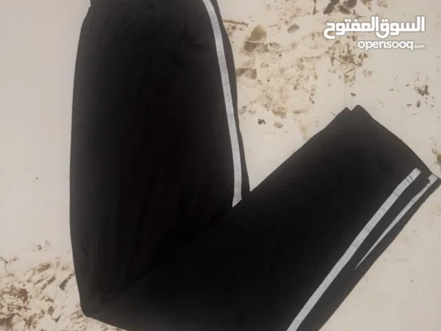 Black striped pants for sporting