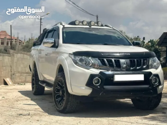 ميتسوبيشي هنتر 2019 اوتومات ديزل 4*4 فل اضافات نخب