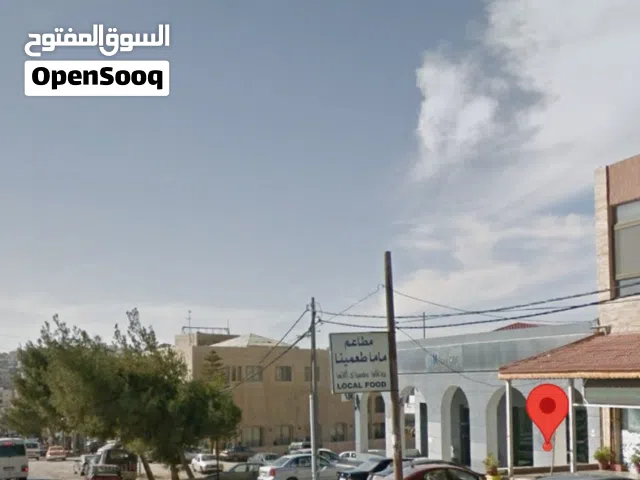 مجمع مخازن فاخر بمساحة 400م مفتوحة بالكامل - الثنية، شارع البنوك