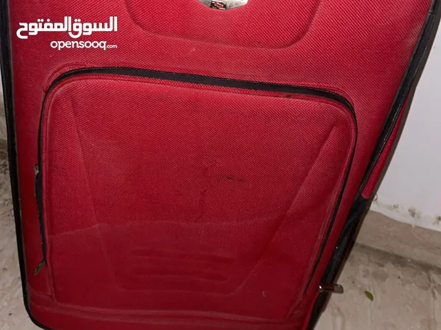 شنطة سفر حمرا حياكم