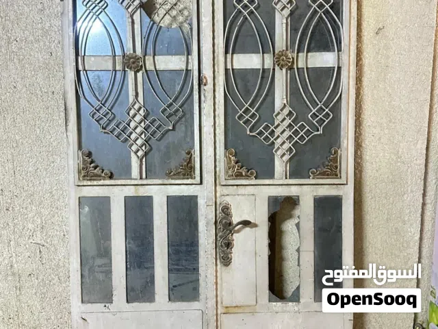 باب حديد ثقيل طلاكتين