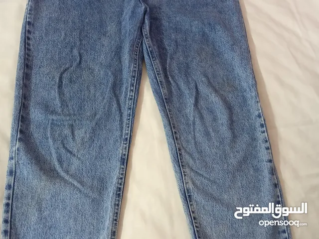 بنطلون جينز ازرق غامق ازرق فاتح متوسط بنطلون كارجو بنفسجي متلبسش  بنطلون اسود  واسع