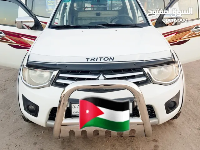 L 200 بكم ميتسوبيشي بنزين 2015 قير عادي