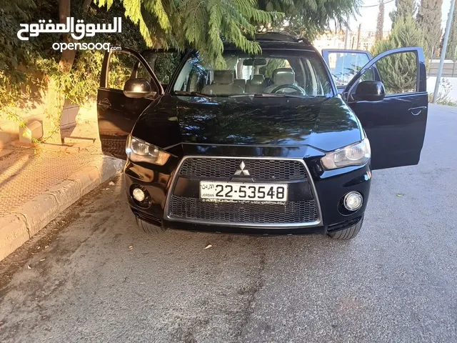 ميتسوبيشي اوتلاندر فحص كامل لون اسود مميز 4WD