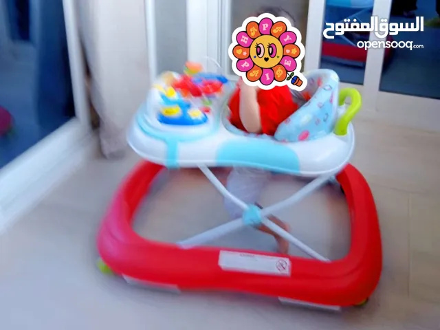 -Baby walker junior brand- بحاله جيده جدا مشايه اطفال
