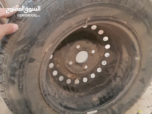 Bridgestone 13 Tyre & Wheel Cover in Tripoli