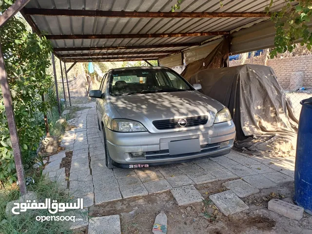 اوبل استرا وارد ياباني 2002 رقم بغداد انكليزي