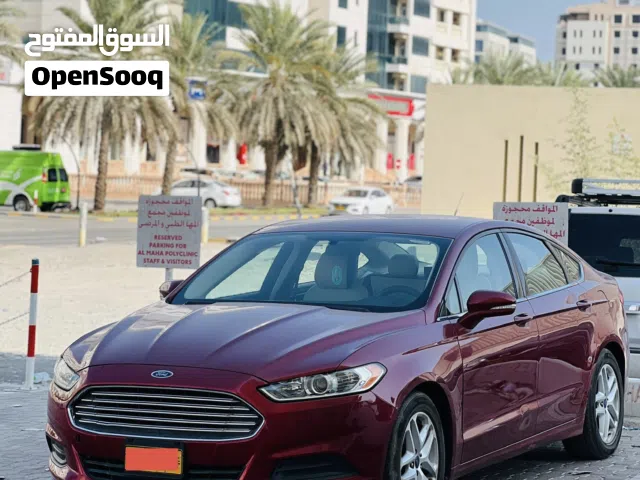 Ford fusion 2014 sedan- expat leaving - family driven car for sale