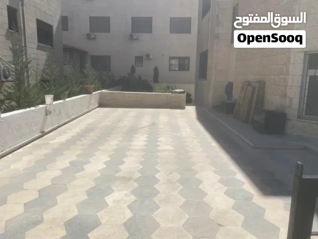 شقة فارغة - عبدون - 250م - ارضية - ترس - حديقة - موقع مميز