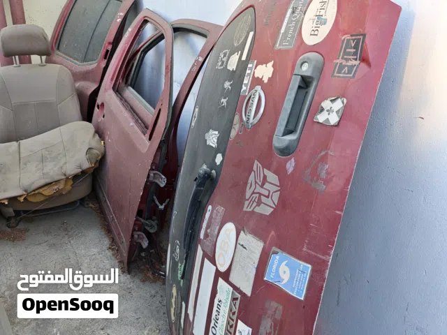 خمس ابواب نيسان اكستيرا 2010 بابين قدام وبابين ورا و باب دبة Nissan Xterra doors لون احمر