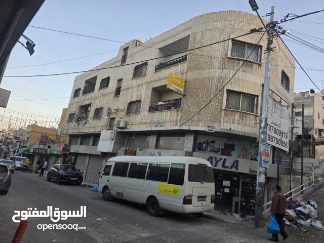 عمارة تجاري سكني وقطعة أرض للبيع في الرصيفة