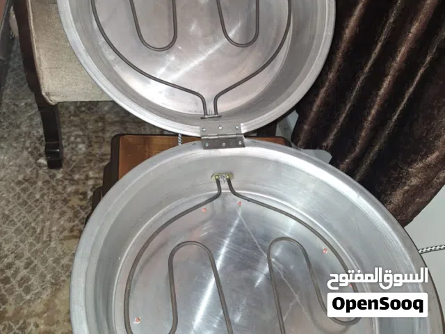 طنجرة شوي وخبيز كهربائية