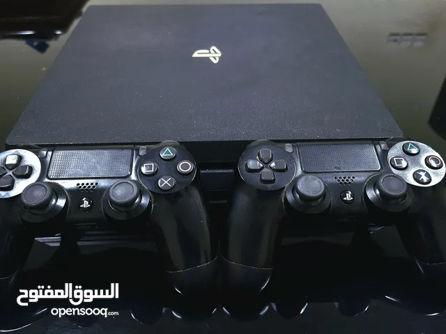 PS4 pro with 2 controllers with 2 CDs جهاز بلايستيشن 4 برو مع دراعين و لعبتين فيفا 18 و 19