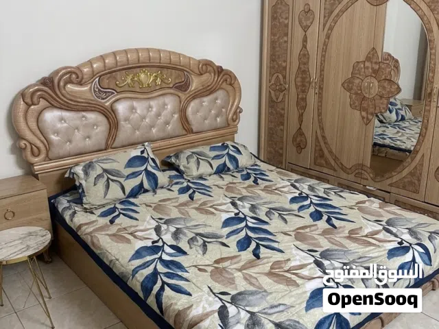 غرفة نوم كاملة سرير نفرين + كنتور ست ابواب + ميز تواليت