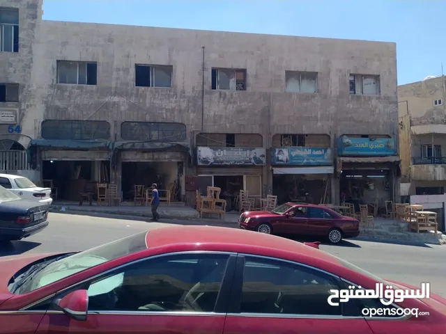 مجمع تجاري و صناعي بموقع مميز