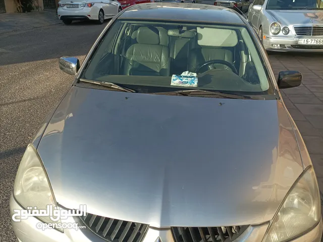 ميتسوبيشي لانسر موديل 2005 العقبة 4600وضعها ممتاز الحمدلله. قير توماتيك