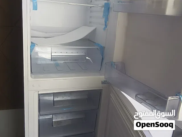 تلاجة كزيوني جديدة بضمان