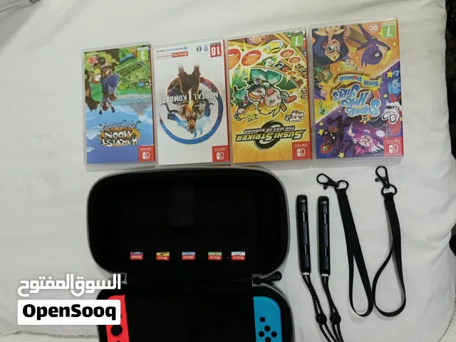 Nintendo switch console and 5 games