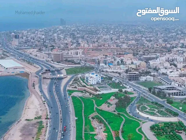 قطعة ارض 950م واجهتان على رئيسي خدمات الشط سوق الجمعه