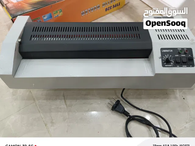 ماكنة تجليد حراري