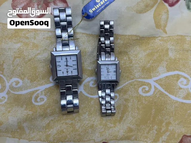 Brand new swisscardin male and female silver watch