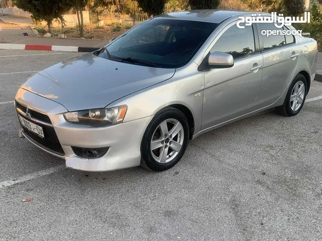 ميتسوبيشي لانسر 2012 اصل اسكرا ضفه لون سكني تحكم كشافات زينو جنط مغنسيوم تعتيم فرش جلد اصلي مس
