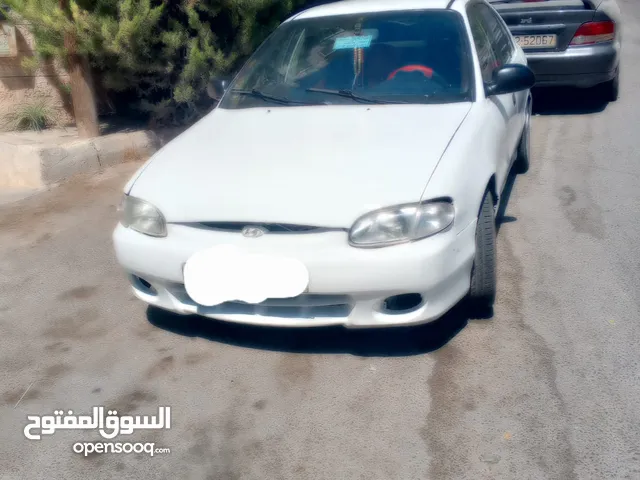 هيونداي اكسنت لون ابيض للبيع خالي قص قلبان والسعر قابل للتفاوش بشيء بسيط