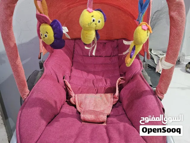 كرسي اطفال هزاز من شركة جنيور و سرير اطفال متنقل