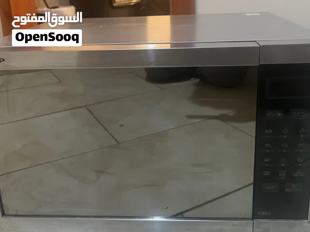 Sharp 20 - 24 Liters Microwave in Amman
