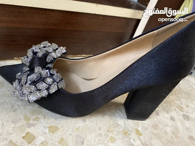 Black With Heels in Amman