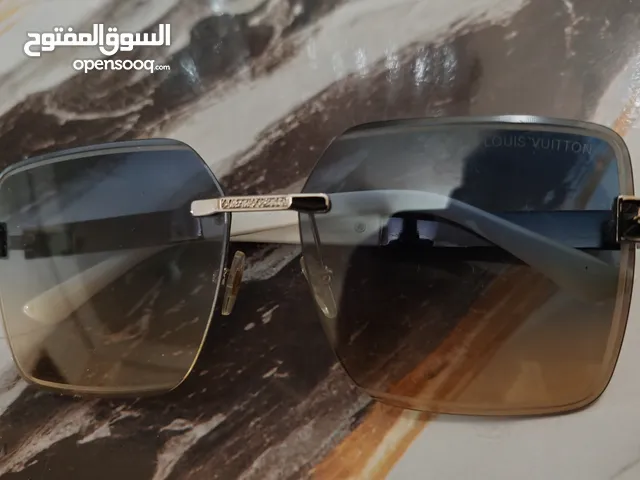 LOUIS VUITTON shades. Whatsapp