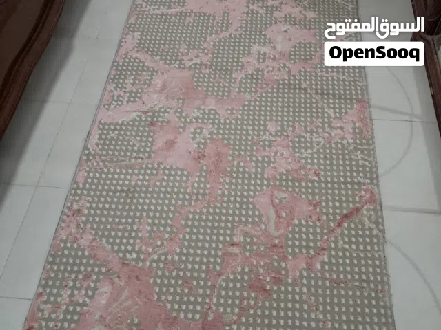 سجاد قص لون زهري