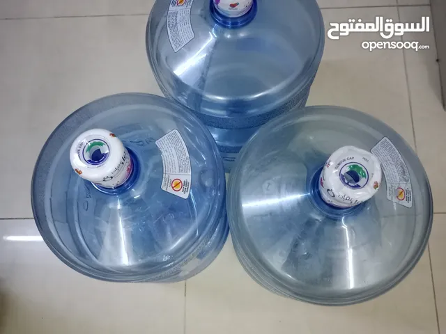 زجاجات مياه الواحة