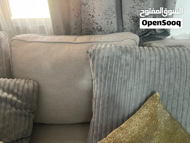 كنب لون رمادي